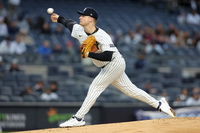 Yankees cut 2 pitchers, return Schmidt and Hamilton