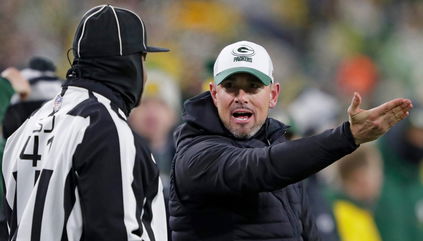 WATCH: Packers Head Coach Gets Into Intense Argument With Lions Fan On The Field