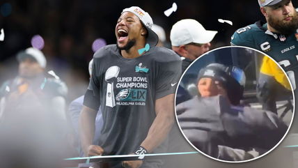 Saquon Barkley pulled Eagles ball boy to join Super Bowl LIX parade has fans in shock: “Bro just picked up a grown man!