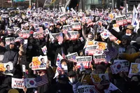 Impeached South Korean president threatens to arrest anyone trying to arrest him