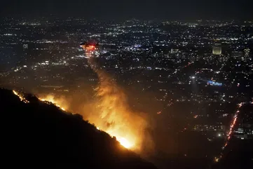 Fire breaks out in Hollywood Hills as California reels from destruction