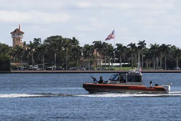 Trump defies Biden and DeSantis by raising flags at Mar-a-Lago