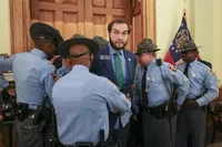 Georgia state senator allowed back in chambers after ban led to his arrest