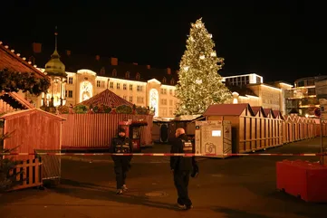 Man arrested after plowing car into Christmas market in Germany, killing two