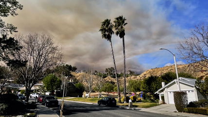 Over 50,000 under evacuation orders or warnings as wildfire imperils homes north of Los Angeles