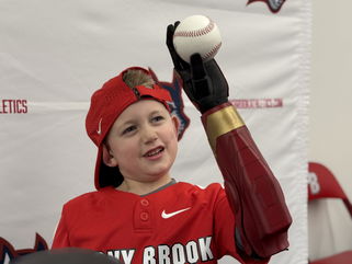 LI boy from Dix Hills, born without a left hand, shows off new bionic arm