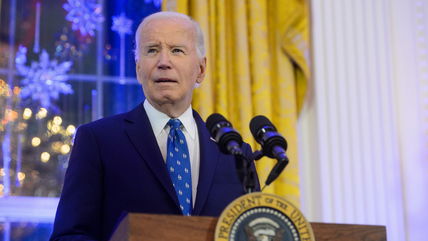 Biden signs bill that averts a government shutdown and brings a close to days of Washington upheaval