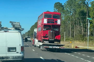 On the road again: St. Augustine’s famed double decker British bus hauled away after 36 years