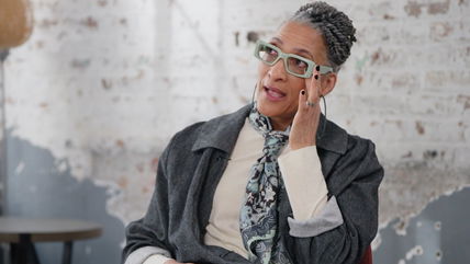 Carla Hall gets emotional recalling a former TV boss doubting her—until she proved them wrong